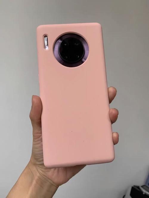 华为mate30Pro下雨天拍照反光有粉色小点点,还有点偏粉色本来的灯光不是...