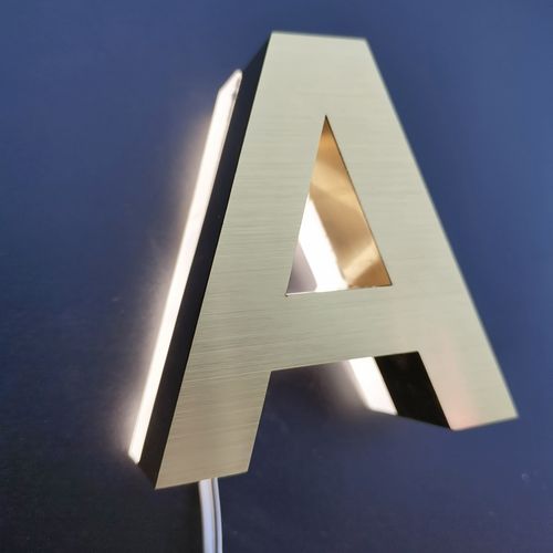 钛金背发光字怎么安装