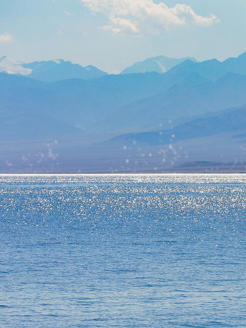 拍照时怎么让白色背景的颜色淡些,物体颜色更突出呢