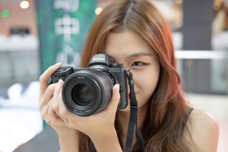 拍人像哪个相机好