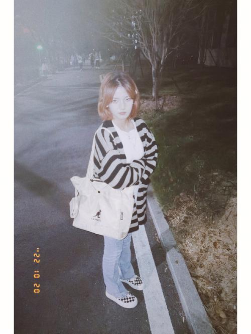 矮个女孩怎样拍照显的高点呢