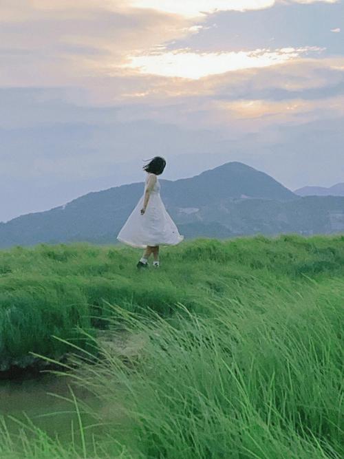 冬天穿风衣怎样在潘阳湖拍照