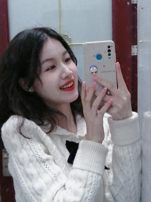 自拍手机角度怎么拿镜头图1