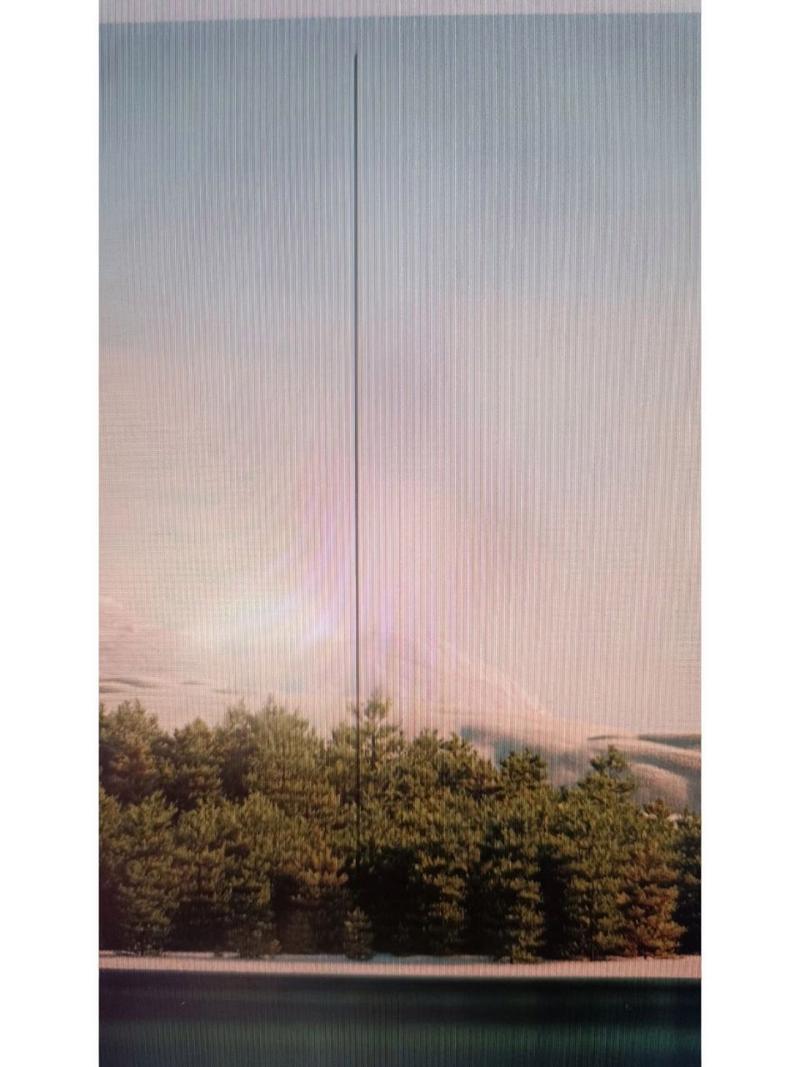 手机拍电脑屏幕有条纹,是什么原因呢?